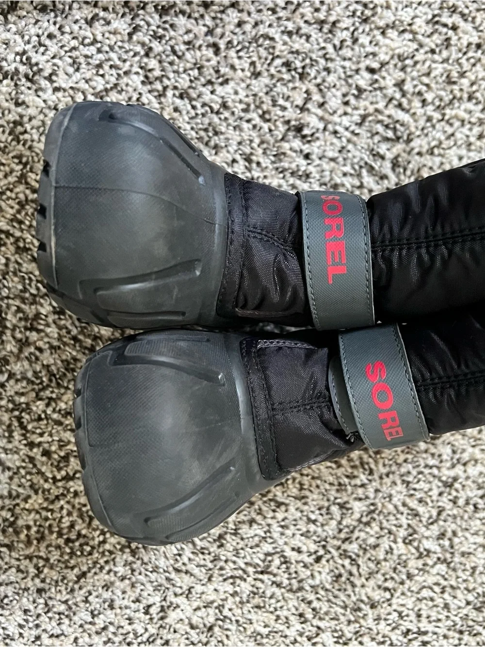 Sorel Black Kids Snow Boots with red Logo Accents size 10